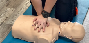 Hands-on chest compression practice for AHA BLS Provider Skills Review